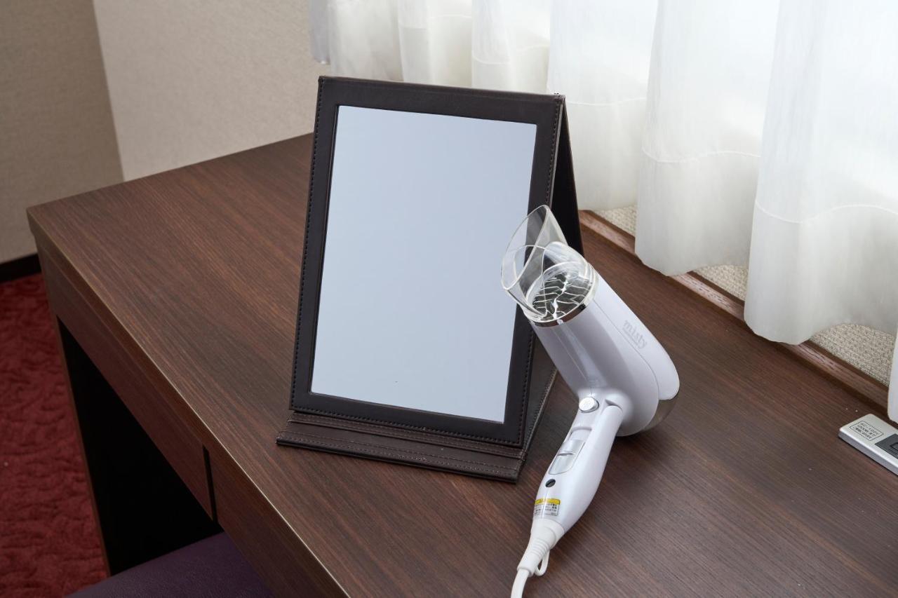 Hotel Axia Inn Sapporo Susukino Екстер'єр фото